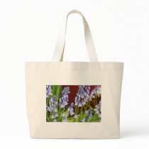 Bellflowers in Front of a Red Wall Canvas Bag