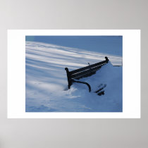 Bench buried under a blanket of snow posters
