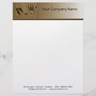 Best Friends Dog Paw and Hand Print in the Sand letterhead
