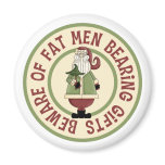 round_magnet - This Christmas graphic features Santa Claus holding a Christmas tree, with the funny caption, Beware Of Fat Men Bearing Gifts.: Sizes  Available colors: 0