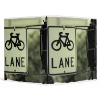Bicycle sign in the city binder