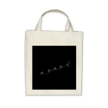 Bicyclist going over the hill tote bags