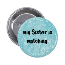Big Sister is watching. Round blue button