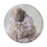 big teddy bear holds little bear magnet
