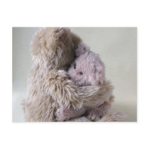 big teddy bear holds little bear postcard
