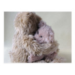 big teddy bear holds little bear postcard