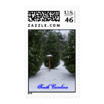Bird feeder in the snow stamp
