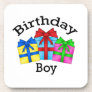 Birthday boy in black with presents drink coaster