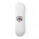 Birthday boy in black with presents skateboard deck