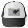 Black alpine goat doe running away to right trucker hat