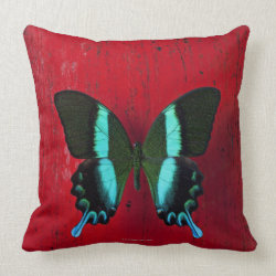 Black and blue butterfly on red wall throw pillow