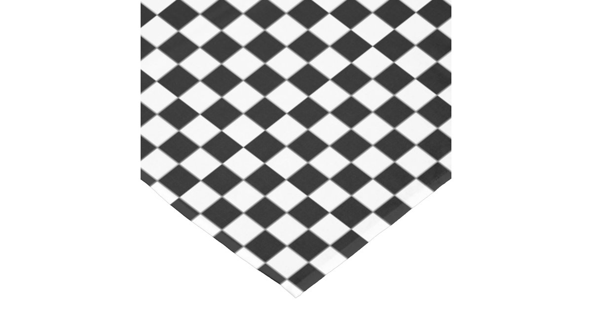 It's free shipping made easy This black & white tablecloth is often see in low-key food establishments, such as seafood restaurants, delis, and diners. The checkered pattern is casual to set a laid back tone in the venue. Many caterers use the black & white tablecloth for events due to the classic look.