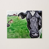 black and white cow painting. puzzles