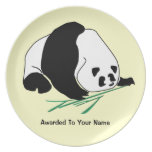 Black and White Panda Eats Bamboo On Plate