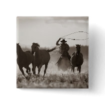 Black and White photo of a Cowboy Lassoing Horses Pin