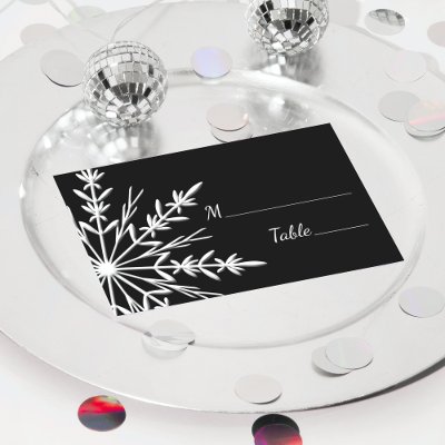 Image is an intricate white snowflake design on a black background. Image is an intricate white snowflake design on a black background.