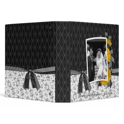 Black and white vintage wedding album adorned with yellow gerber daisies and