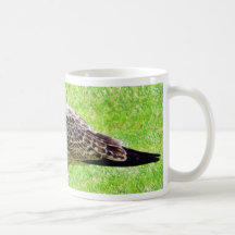 Black Beaked Sea Bird On Grass Mug