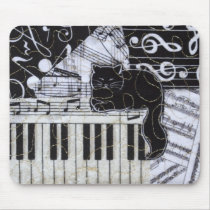 Black Cat on a Keyboard Mouse Pad