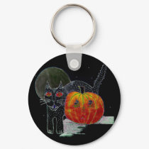 black cat pumpkin and moon keychains