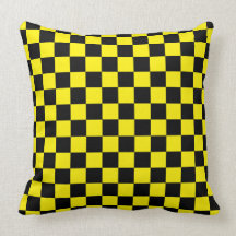 Black checkers on yellow background pillow