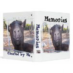 Black goat big yellow eyes nose first view binder