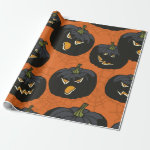 Black Halloween Pumpkins on Orange Wrapping Paper