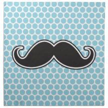 Black handlebar mustache on blue polka dot pattern napkin