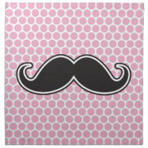 Black handlebar mustache on pink polka dot pattern cloth napkin