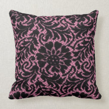 Black lace on pink pillow