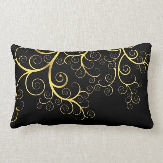 Black pillow with fancy golden s twir illustration