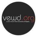 Black round sticker by VewdMedia Black round sticker