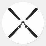 black skier crossed round sticker