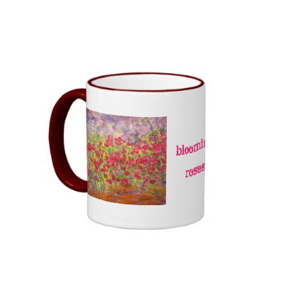 blooming roses(slogan) mugs by folkrockartist