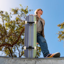 Blue and green striped skateboard