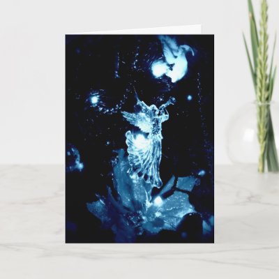 Blue angel on black Christmas card