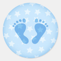 Blue baby footprints on a starry background round sticker