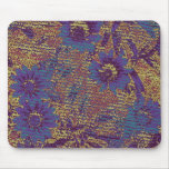 Blue flowers against leaf camouflage pattern mousepad