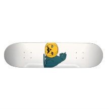 blue grey cat looking at pumpkin skate board