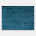 Blue painted wood planks lawn signs