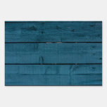 Blue painted wood planks lawn signs