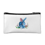 blue rabbit with flowers sitting.png makeup bags