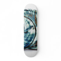 Blue Sea Shell On White Background skateboards
