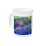 Blue solution in glass vessel pitchers