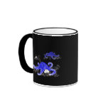 Blue Starfish on black background mug