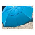 blue umbrella on the beach posters