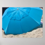 blue umbrella on the beach poster