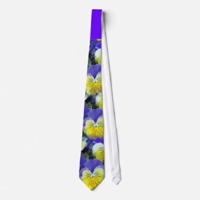 Bright blue and yellow violas decorate this colorful floral wedding tie