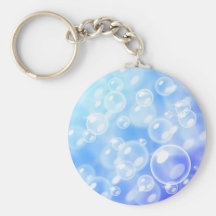 Blurred bubbles over blue keychain