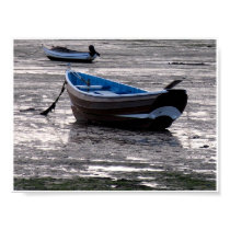 Boat in Lindisfarne harbour posters